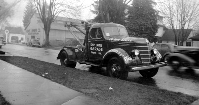 Day-Nite Garage tow truck, rainy day, Eugene, Oregon 1940