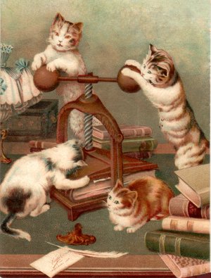Cats using hand book-press