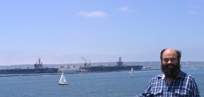 U.S. Navy aircraft carriers, sailboats<br />
					San Diego Harbor; Robert W. Franson